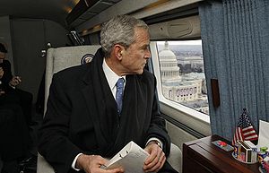 Former President George W. Bush looks out over...