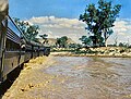 Proceeding through the Finke River was possible with trains hauled by steam locomotives but not with diesel-electrics because of their low-slung traction motors