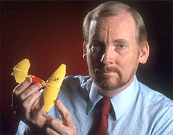 Robert C. Michelson holding one of his aerial robotic inventions: the Entomopter (U.S. Patent No. 6,082,671)