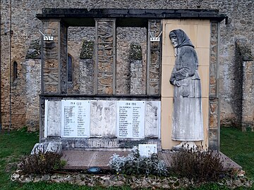 Monument aux morts de Bascons représentant une Landaise, la « Méninotte », pleurant ses enfants.