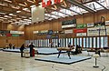 Preparation of the competition hall with flags of the participating countries on the hall ceiling