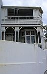 These nine houses form part of a unique terrace consisting of a row of identical late-Victorian double-stoleyed semi-detached houses which were erected at the turn of the twentieth century and have since remained unaltered.