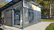 Toilet block at a park in Brisbane, Australia: the toilet block has two cubicles, both marked as unisex and accessible toilets, and a sink outside of the cubicles for handwashing. Accessible public toilet block at a playground in Brisbane suburb of Wishart 2.jpg