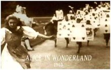 Screenshot from the first film version of Alice in Wonderland (1903) Alice in Wonderland (1903 film).jpg