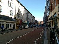 USL Europe's offices were in Ealing, London (in the building on the right side after the road bends, as seen here in 2009) High Street in Ealing.jpg