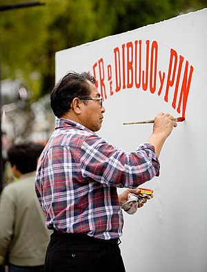 Sign painter in the Miraflores sector of Lima,...
