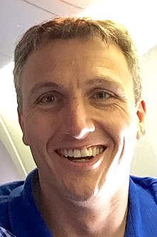 Lyndon Rive on a plane in 2019