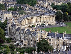 Royal Crescent, seen
                  from a hot air balloon. There is a contrast between
                  the architectural style of the public front and the
                  private rear of this crescent.