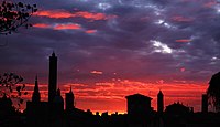 Skyline of Bologna against the sunset.jpg