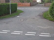 This short stretch of tarmac links Westend, Garthorpe to Station Road, Fockerby. The two villages were once separated by a course of the River Don which this road crosses. They were also in different counties, Garthorpe being in the Parts of Lindsey, Lincolnshire and Fockerby in the West Riding of Yorkshire. The two villages were joined with the creation of Humberside and were in Boothferry District. Since 1996 they are in North Lincolnshire.