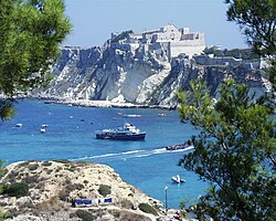 A view of San Nicola island from the nearby San Domino island, with the Abbey of Santa Maria a Mare fortified complex.