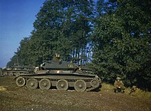 British Army soldiers with a Covenanter tank during a World War II military exercise, 1942 An Army Training Exercise in Britain, 1942 TR103.jpg