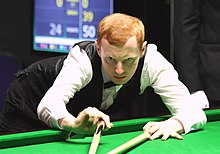 Anthony McGill playing a shot