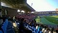 The western stand (red seats)