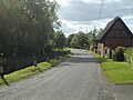 View west up Bishop's Walk, Forthampton. Main pond is on the left of the photograph.