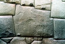 The twelve angle stone, in the Hatum Rumiyoc street of Cusco, is an example of Inca masonry. CuscoPiedra12angulo.jpg