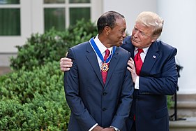 President Donald Trump presents the Medal to Tiger Woods, 2019