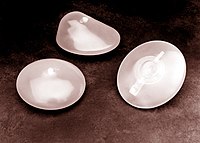 Breast implants, an example of a biomedical engineering application of biocompatible materials to cosmetic surgery.