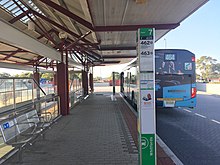 Bus stops with large shelter