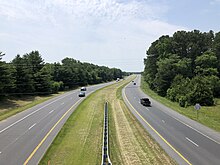 MD 313 southbound and MD 404 eastbound in Denton 2022-06-22 11 55 07 View south along Maryland State Route 313 and east along Maryland State Route 404 (Shore Highway) from the overpass for Camp Road in Denton, Caroline County, Maryland.jpg