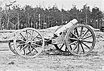 A 21 cm mortar attached to a limber for transport.