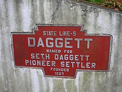Keystone Marker for Daggett, Pennsylvania inlaid in cement wall