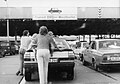 Transit traffic from West Germany waiting to enter West Berlin at the East German checkpoint at Drewitz in 1986. Drivers and passengers would push their cars to save fuel.