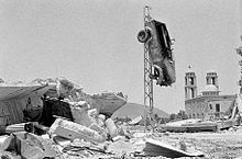 Quneitra village, largely destroyed before the Israeli withdrawal in June 1974. Destruction in the al-Qunaytra village in the Golan Heights, after the Israeli withdrawal in 1974.jpg