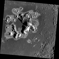 Hollows surround the central peak complex of Eminescu crater