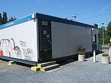 mobile-home qui fait office de bâtiment voyageurs