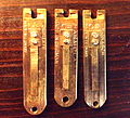 Pictured are three German harmonium reeds stamped with the names Jubilate, Harmola and Monarch. These are three 'brands' of German harmonium reeds although 'Jubilate' is probably the most common and there are more brands out there including 'Organa', 'Happy','Dulmira',[1] 'B.B.D' and more. Although the three reeds are from different 'brands' all were built on the same machinery that was imported from the USA to Germany to make brass suction organ reeds which were being made in Germany at that time (There is some doubt about the 'Harmola' reeds being made on the same machine. The holes in the bottom and the notch at the tops of the reeds were drilled later to install them on the reed boards of Indian style harmoniums.