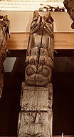 Haida, Old Kasaan Totem Pole. The eagle at the top of the pole is successful in its hunt, holding a salmon in its talons. Beneath it a frog represents the frog clan and holds an ornate bentwood box. Totem Heritage Center, Ketchikan, Alaska