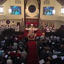 A Christmastide service at Holy Cross Cathedral. Holy-cross-cathedral-nave-chancel.jpg