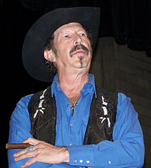 Friedman contemplates a question from the audience at a campaign rally in Bastrop during the 2006 Texas gubernatorial campaign. Kinky friedman 2006.jpg