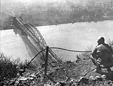 Dan Feltner of Company C., 656th Tank Destroyer Battalion, views the Ludendorff Bridge from the top of Erpeler Ley. Ludendorff Bridge from Erpeler Ley.jpg