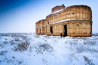 Winter picture of Chiajna Monastery. The monastery is situated on the outskirts of Bucharest.  by Mihai Petre (licensed CC-BY-SA 3.0)