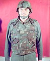 A man in 1975 modelling an early ERDL-patterned prototype of the PASGT vest, with two PALS webbing strips on the front.