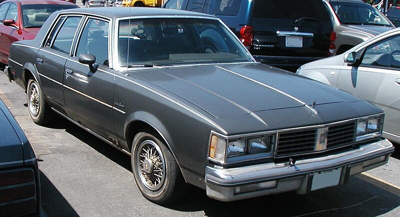  a compact car and what I got was an Oldsmobile Cutlass likes this 