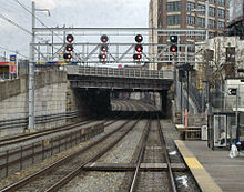 Looking north from North Broad station with the former Ford Building visible in the background SEPTA Main-Line-Signal-29x.jpg