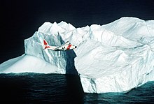 An ice patrol aircraft inspecting an iceberg USCG International Ice Patrol C-130.jpg