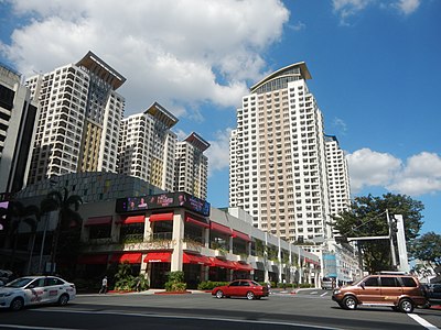 The New Frontier Theater, along with the Manhattan Parkway and the Manhattan Parkview in the background.