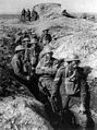 Image 16 Poison gas in World War I Photo cr: Frank Hurley A group of Australian infantry wearing Small Box Respirators (SBRs) at the Third Battle of Ypres in September 1917. After the introduction of poison gas in World War I, countermeasures were developed. SBRs represented the pinnacle of gas mask development during the war, a mouthpiece connected via a hose to a box filter (hanging around the wearer's neck in this picture), which in turn contained granules of chemicals that neutralised the gas. The SBR was the prized possession of the ordinary infantryman; when the British were forced to retreat during the German Spring Offensive of 1918, it was found that while some troops had discarded their rifles, hardly any had left behind their respirators. More featured pictures