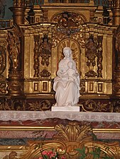 Statuette de la Vierge du Beau Rameau par Joseph Alexandre Renoir (1845), placée sur le maître autel.