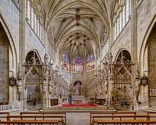 View from the nave of the chancel of Condom Cathedral in France, with ambulatories and two altars, the modern one in the choir Cathedrale Condom Choeur BLS.jpg