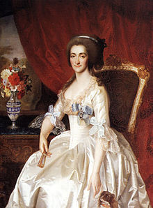 Old portrait of a seated woman in a white stone dress with blue trim and a dog near her left hand