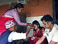 Image 6Senior offering Dashain Tika on great Nepali Hindu festival at a traditional home. (from Culture of Nepal)