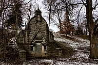 A photo of a historic Mausoleum for the Gussman family, built in 1889, located in Oakwood Cemetery, Syracuse, New York.