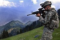 ISAF soldier looking for enemy positions in Kunar Province of Afghanistan.jpg
