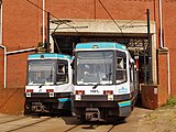Two T68s at the entrance to Victoria station in 2008.