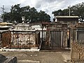 St. Louis Cemetery No. 1, many 19th century tombs have wrought iron fences